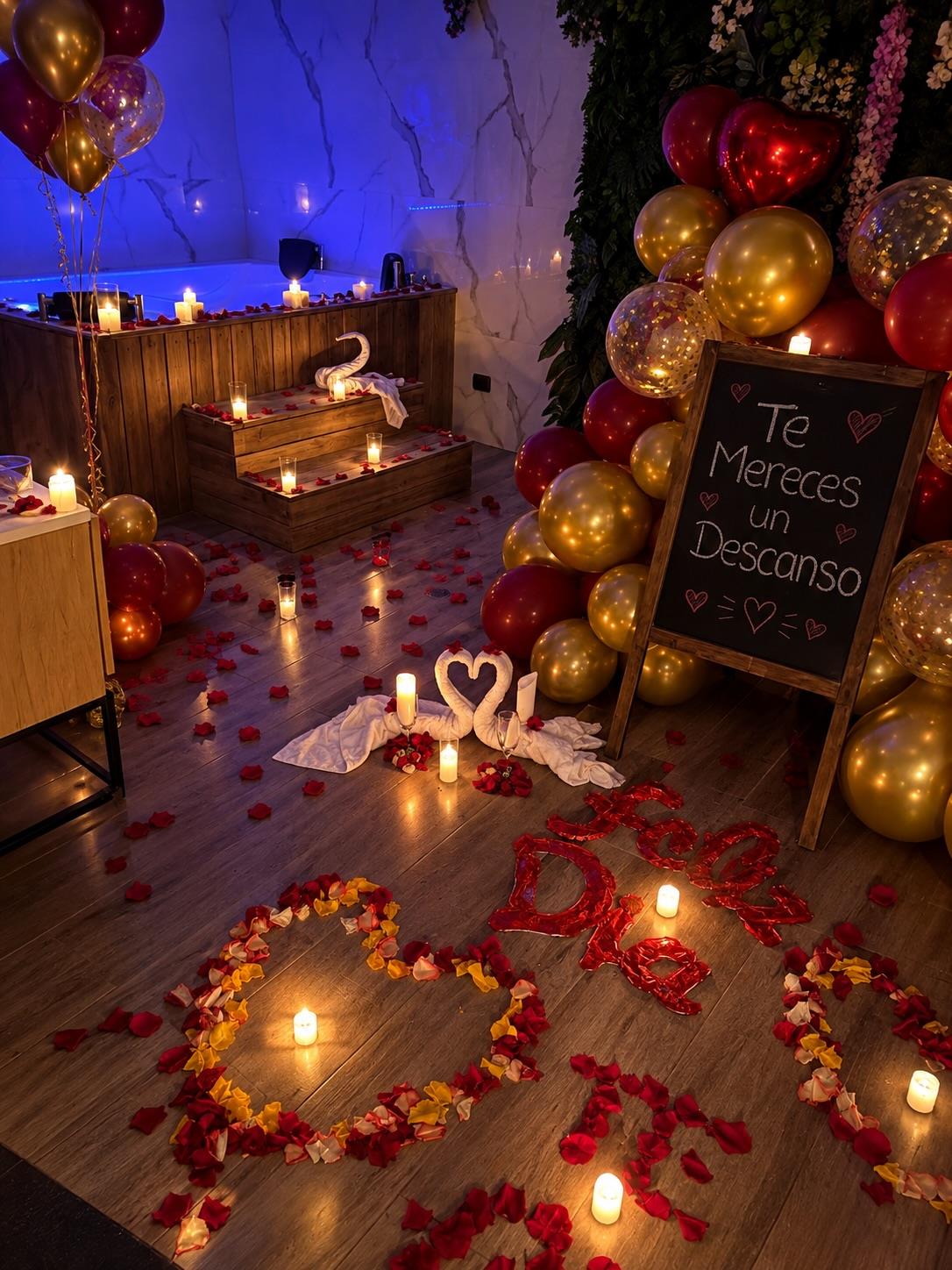 Sala decorada con velas, globos y pétalos